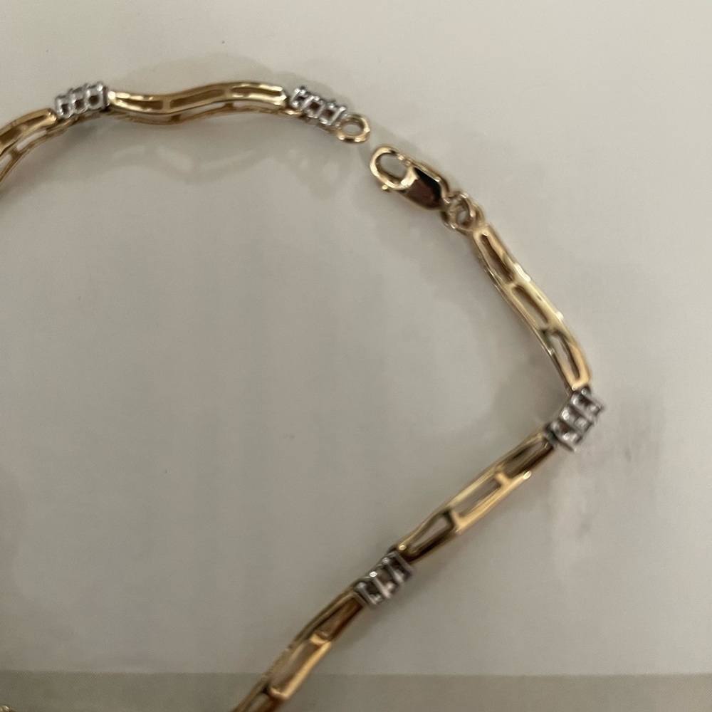 Gold and diamond bracket beautiful only worn a few times.